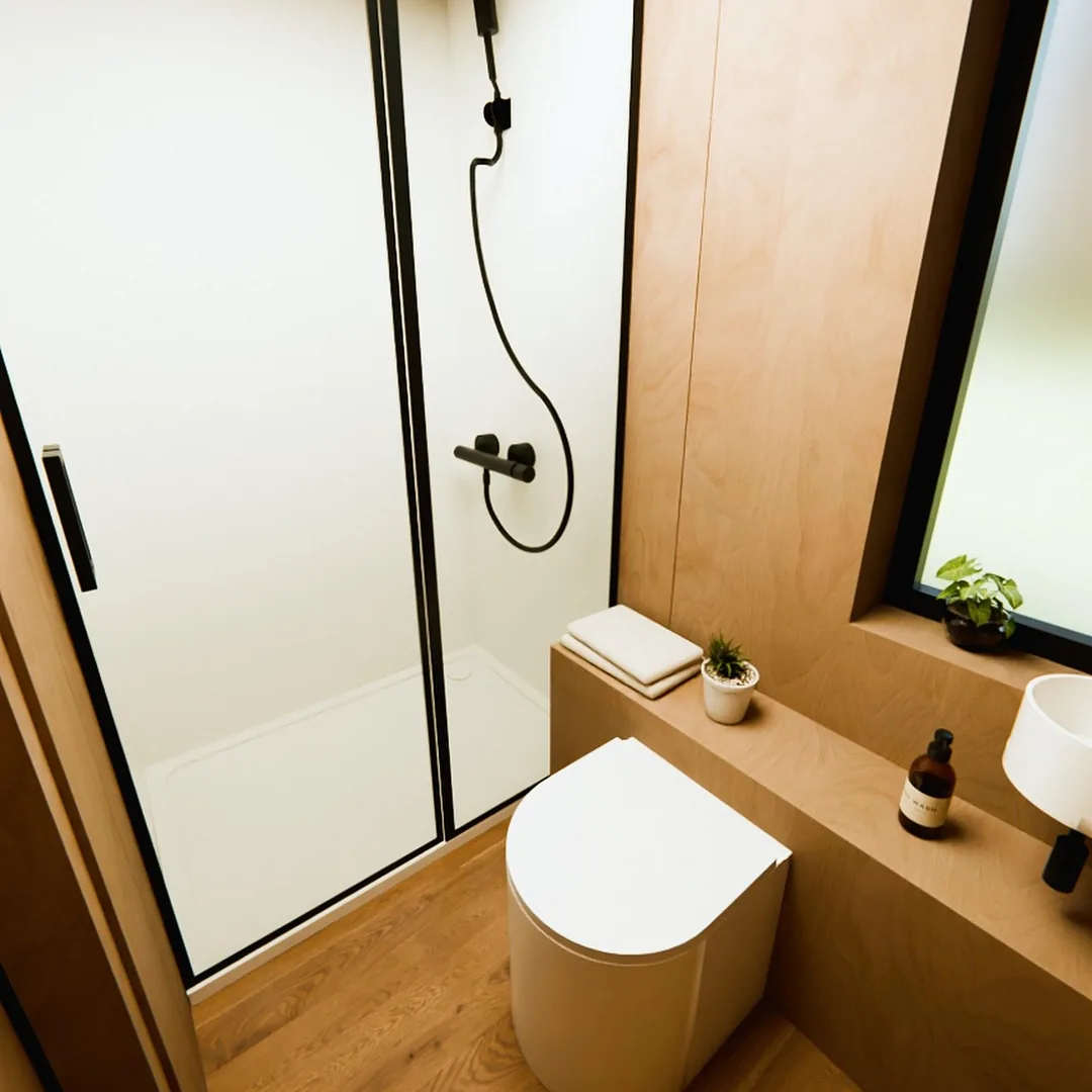 The bathroom add-on: glass shower, separating toilet and basin under a frosted window (visualisation)